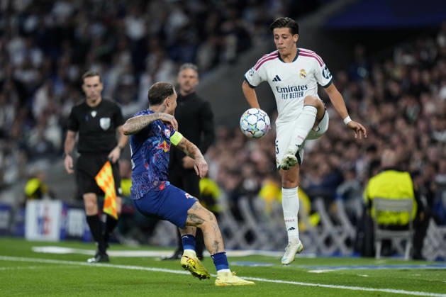ESP: Real Madrid v RB Leipzig. UEFA Champions League. Matchday 3. David Raum of RB Leipzig and Arda Guler of Real Madrid CF during the UEFA Champions League match between Real Madrid and RB Leipzig played at Santiago Bernabeu Stadium on 21 Oct 2026 in Madrid, Spain. kpng Copyright: xCesarxCebollax xPRESSINPHOTOx PS_2627_RMA_LEI_007
