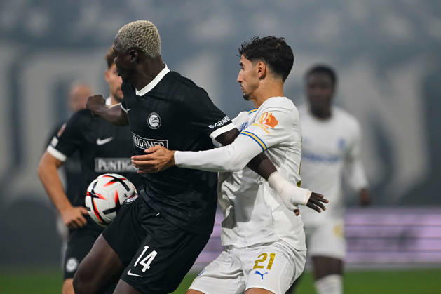 SOCCER - UEFA EL, Sturm vs Marseille GRAZ,AUSTRIA,22.OCT.26 - SOCCER - UEFA Europa League, SK Sturm Graz vs Olympique de Marseille. Image shows Oumar Diakite (Sturm) and Nayef Aguerd (Marseille).  GEPAxpictures xAvnixRetkoceri