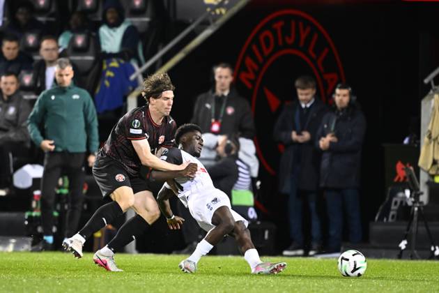 FC Midtjylland v Sint-Truidense VV - UEFA Conference League HERNING, DENMARK - OCTOBER 22 : Bech Mads defender of Midtjylland and Mbuku Nathanael forward of Sint-Truidense VV during the UEFA Conference League 2026 27 League Phase matchday 2 match between FC Midtjylland and Sint-Truidense VV on October 22, 2026 in Herning, Denmark, 22 10 2026 Herning Denmark  Copyright: xTomasxSiskx