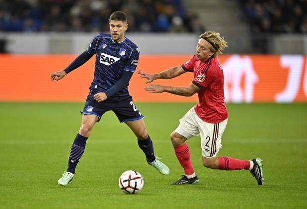 Zweikampf, Aktion Mads Bidstrup Olympique Lyon (02) gegen Andrej Kramaric TSG 1899 Hoffenheim (27) TSG 1899 Hoffenheim vs Olympique Lyon 22.10.2026 DFL REGULATIONS PROHIBIT ANY USE OF PHOTOGRAPHS AS IMAGE SEQUENCES AND OR QUASI-VIDEO TSG 1899 Hoffenheim vs Olympique Lyon