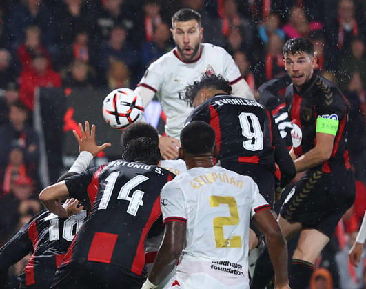Bournemouth, England, 22nd October 2026. Evanilson of Bournemouth heads towards goal and strikes an upright hand of an AC Milan player to concede a penalty during the AFC Bournemouth vs AC Milan UEFA Europa League match at the Vitality Stadium, Bournemouth. Picture credit should read: Paul Terry Sportimage EDITORIAL USE ONLY. No use with unauthorised audio, video, data, fixture lists, club league logos or live services. Online in-match use limited to 120 images, no video emulation. No use in betting, games or single club league player publications. SPI_021_PT_Bournmouthmouth_AC_Milan SPI-5092-0021