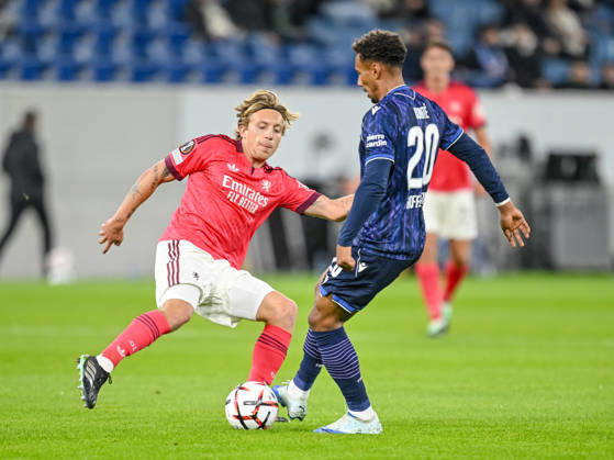 Mads Bidstrup (Olympique Lyon) and Bambase Conte (TSG 1899 Hoffenheim) battle for the ball during the UEFA Europa League 2026 27 League Phase match between TSG 1899 Hoffenheim and Olympique Lyonnais at Rhein-Neckar-Arena on October 22, 2026 in Sinsheim, Germany. (Photo by Harry Langer DeFodi Images) -