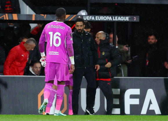 Bournemouth, England, 22nd October 2026. Mike Maignan of AC Milan walks off the pitch following his red card during the AFC Bournemouth vs AC Milan UEFA Europa League match at the Vitality Stadium, Bournemouth. Picture credit should read: Paul Terry Sportimage EDITORIAL USE ONLY. No use with unauthorised audio, video, data, fixture lists, club league logos or live services. Online in-match use limited to 120 images, no video emulation. No use in betting, games or single club league player publications. SPI_028_PT_Bournmouthmouth_AC_Milan SPI-5092-0027