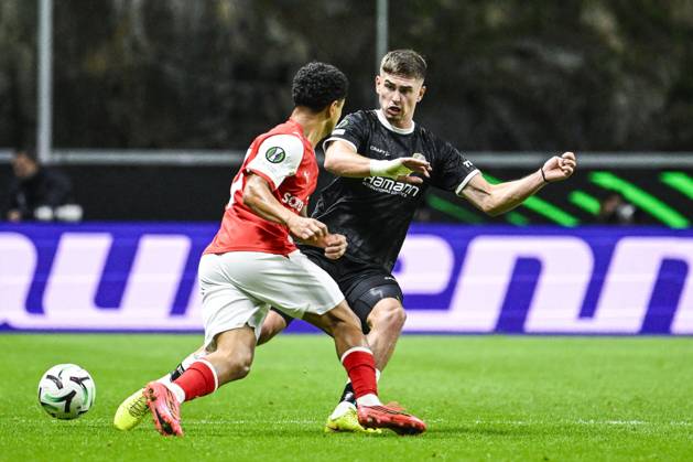 Gabriel Silva of SC Braga and Maksim Paskotsi of KAA Gent pictured in action during a soccer game between Portuguese SC Braga and Belgian soccer team KAA Gent, Thursday 22 October 2026 in Braga, Portugal, the second match in the UEFA Conference League league phase. TOM GOYVAERTS TomxGoyvaerts  x190690436x