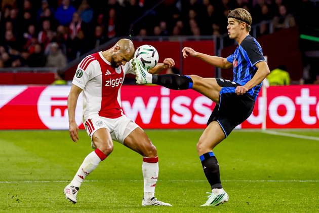 AMSTERDAM - Sofyan Amrabat of AFC Ajax battles for possession with Charles De Ketelaere of Atalanta BC during the UEFA Conference League match between AFC Ajax and Atalanta BC at the Johan Cruijff ArenA on October 22, 2026 in Amsterdam, the Netherlands. WART BRINKERHOF ANP Conference League 2026 27 xVIxANPxSportx xMarcelxterxBalsxIVx 573296825 originalFilename: 573296825.jpg