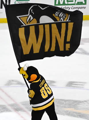 Pittsburgh Penguins mascot IceBerg celebrates the Penguins 4-0 win against the Florida Panthers at PPG Paints Arena in Pittsburgh on Thursday, October 22, 2026.  PIT2026102216 ARCHIExCARPENTER
