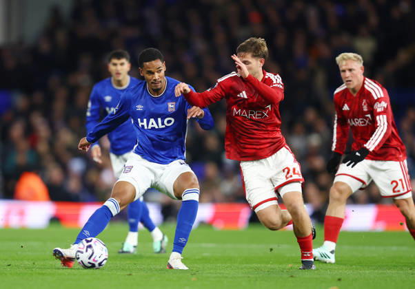 Ipswich, England, 23rd October 2026. Emersonn of Ipswich Town tackles by James McAtee of Nottingham Forest during the Ipswich Town vs Nottingham Forest Premier League match at Portman Road, Ipswich. Picture credit should read: Paul Terry Sportimage EDITORIAL USE ONLY. No use with unauthorised audio, video, data, fixture lists, club league logos or live services. Online in-match use limited to 120 images, no video emulation. No use in betting, games or single club league player publications. SPI_013_PT_Ipswich_Forest SPI-5093-0013