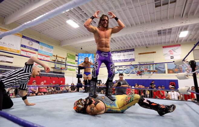 October 15, 2016 - Oceanside, California, USA - 10 15 2016_Oceanside, CA_SoCal Pro Wrestling s Rumble in Oceanside event at the Oceanside Boys & Girls Club gymnasium. Wrestler Ricky Mandel stands on opponent Motros Jungle._Photo by Oceanside USA - ZUMAn47_