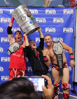 October 15, 2016 - Oceanside, California, USA - 10 15 2016_Oceanside, CA_SoCal Pro Wrestling s Rumble in Oceanside event at the Oceanside Boys & Girls Club gymnasium. At intermission fan Richard Babiarz, middle, has his photo taken with champion tag-team PBR, that stands for Partying, Brawlin and Rasslin ._Photo by Oceanside USA - ZUMAn47_