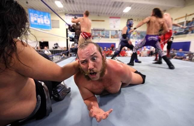 October 15, 2016 - Oceanside, California, USA - 10 15 2016_Oceanside, CA_SoCal Pro Wrestling s Rumble in Oceanside event at the Oceanside Boys & Girls Club gymnasium. Wrestler Dirty Doug, middle, seems to need a break during the main event that had multiple wrestlers in the ring at the same time._Photo by Oceanside USA - ZUMAn47_