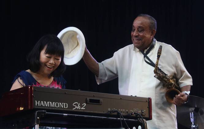 August 27, 2017 - New York, New York, U.S. - Jazz organist AKIKO TSURUGA and jazz legend saxophonist LOU DONALDSON perform during the 25th Anniversary of Charlie Parker Jazz Festival held at Thompson Square Park. New York U.S. - ZUMAk03_ 20170827_zaf_k03_205 Copyright: xNancyxKaszermanx