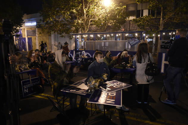 November 3, 2020, San Francisco, California, USA: San Francisco, California, U.S. - Eponymous founder, MANNY YEKUTIEL of Mannys hosted a socially distanced election night watch party in the street in front of the community meeting space. In the past month Mannys had become the defacto Biden-Harris campaign headquarters in San Francisco as dozens of volunteers manned phones and wrote letters to get out the vote. San Francisco USA - ZUMAw332 20201103_zap_w332_006 Copyright: xNealxWatersx