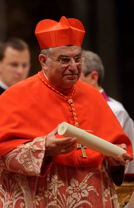 Consistory at the Vatican: Pope Benedict XVI creates 24 new cardinals - Rome New cardinal Paolo Romeo receives the biretta cap from Pope Benedict XVI during the consistory ceremony in Saint Peter s Basilica at the Vatican on November 20, 2010. Pope Benedict XVI formally created 24 new cardinals amid cheers in St. Peter s Basilica, bringing a mostly Italian group into the elite club that will eventually elect his successor.The basilica was awash in red as some 150 cardinals from around the world came to Rome for the occasion of welcoming in their newest members. PHOTO by Eric Vandeville ABACAPRESS.COM Rome Vatican Italy  Copyright: xVandevillexEric ABACAx 252345_053 VandevillexEric ABACAx 252345_053 