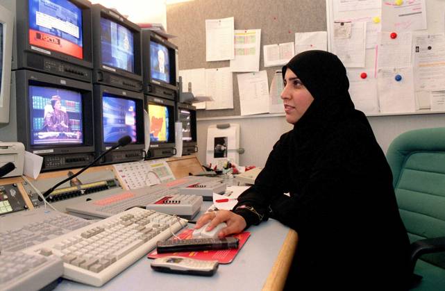 70594 07 Al Jazeera chanel is the largest and most controversial Arabic News Channel in the Middle East offering news coverage 24 hours a day from around the world with focus on the hottest regions of conflict. Al Jazeera founded in 1996, and based in Doha, Qatar. Fatima al Haji workd on the station s graphic service in Doha on November 2001. Photo by Ammar Abd Rabbo Balkis Press ABACA.  Copyright: xBalkisxPress ABACAx 70594_07 BalkisxPress ABACAx 70594_07