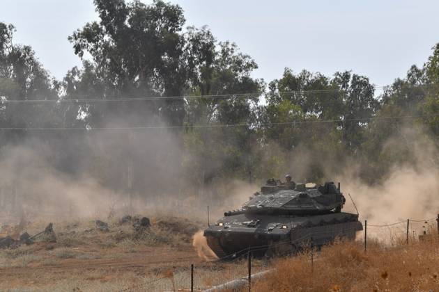 (231008) -- JERUSALEM, Oct. 8, 2023 -- This photo taken on Oct. 8, 2023 shows an Israeli tank in northern Israel near the border with Lebanon. Dozens of rockets and heavy artillery shells were fired toward Israeli positions on the Shebaa Farms, a disputed strip of land at the intersection of the Lebanese-Syrian border and the Israeli-annexed Golan Heights, early Sunday morning, Lebanese army intelligence sources confirmed to Xinhua. In response, the Israeli military fired artillery into the Lebanese area from which the attack originated, an army spokesperson said in a statement. Later, a drone attack was launched, targeting tents set up by Hezbollah in the region, according to the spokesperson. (Gil Eliyahu JINI via Xinhua) ISRAEL-BORD