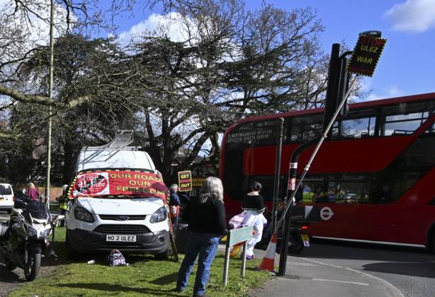 Protesters during a protest against the Ultra Low Emission Zone at the Chislehurst War Memorial in Chislehurst, London. ULEZ cameras in Chislehurst and other nearby areas have been vandalised in previous months.  Copyright: xAlanxStanfordx
