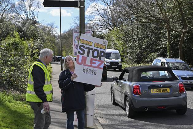 Protesters during a protest against the Ultra Low Emission Zone at the Chislehurst War Memorial in Chislehurst, London. ULEZ cameras in Chislehurst and other nearby areas have been vandalised in previous months.  Copyright: xAlanxStanfordx