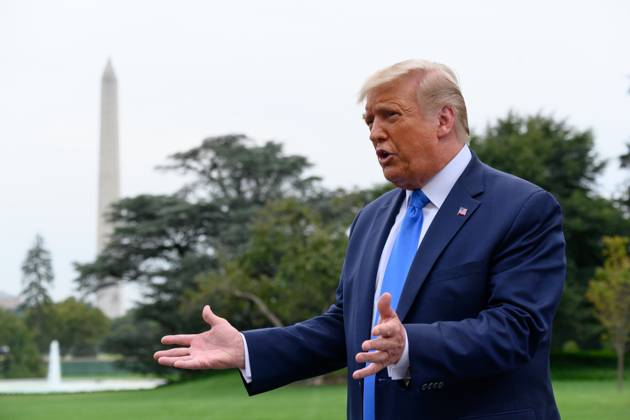 President Donald Trump Speaks to Members of the Media United States President Donald J. Trump speaks to members of the media on the South Lawn of the White House before boarding Marine One in Washington, D.C., U.S., on Thursday, September 24, 2020. Photographer: Erin Scott Bloomberg Credit: Erin Scott Pool via CNP AdMedia Washington District of Columbia United States of America EDITORIAL USE ONLY Copyright: xx 09242020-ES-Trump-418 CNP AdMediax admphotostwo720056