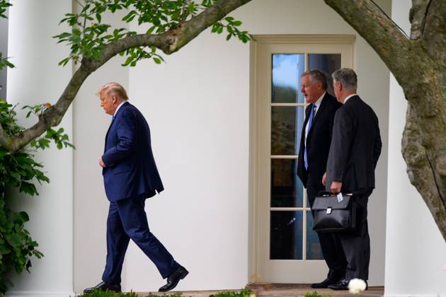 President Donald Trump Speaks to Members of the Media United States President Donald J. Trump, Mark Meadows, Assistant to the President and Chief of Staff, and United States National Security Advisor Robert C. O Brien, depart the Oval Office before walking to the South Lawn of the White House before boarding Marine One in Washington, D.C., U.S., on Thursday, September 24, 2020. Credit: Erin Scott Pool via CNP AdMedia Washington District of Columbia United States of America EDITORIAL USE ONLY Copyright: xx 09242020-ES-Trump-408 CNP AdMediax admphotostwo720071