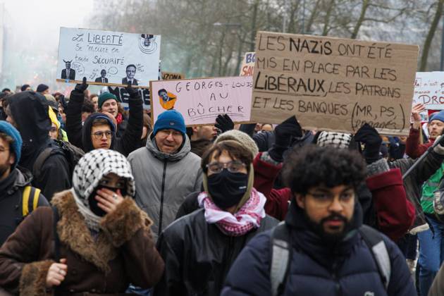 Protesters pictured during a national demonstration against the new government declaration, organized by the three national trade unions, Thursday 13 February 2025 in Brussels. NICOLASxMAETERLINCK 112369360