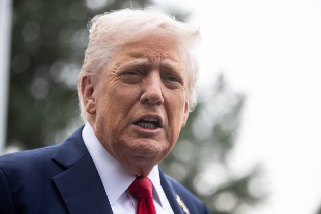 President Donald Trump speaks with reporters as he walks on the South Lawn of the White House on his way to board Marine One on Tuesday, September 30, 2025. He is on his way to Quantico to meet with military officers. WASP2025093002 FrancisxChung