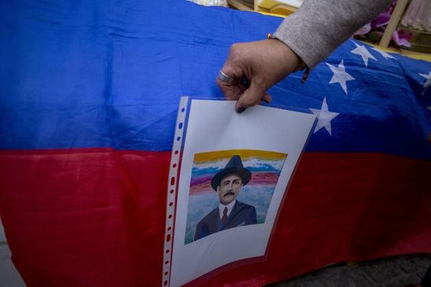 October 11, 2025, Madrid, Madrid, Spain: Members of the Venezuelan community in Madrid holding candles and Venezuelan flags in Opera Square in downtown Madrid, during a vigil to pray the rosary for the beatification of Venezuelans Jose Gregorio Hernandez and Carmen Rendiles on October 19, 2027, in St. Peter s Square, Rome. Madrid Spain - ZUMAs296 20251011_znp_s296_010 Copyright: xLuisxSotox