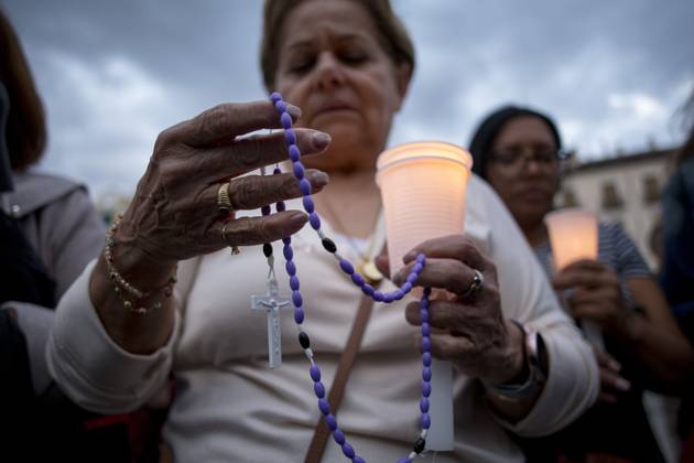 October 11, 2025, Madrid, Madrid, Spain: Members of the Venezuelan community in Madrid holding candles and Venezuelan flags in Opera Square in downtown Madrid, during a vigil to pray the rosary for the beatification of Venezuelans Jose Gregorio Hernandez and Carmen Rendiles in St. Peter s Square. Madrid Spain - ZUMAs296 20251011_znp_s296_011 Copyright: xLuisxSotox