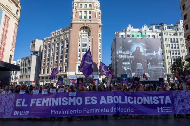 October 11, 2025, Madrid, Spain: Protesters hold a large banner during a demonstration. Demonstration organized by the Madrid Feminist Movement (MFM) under the slogan Abolitionist Law Now, to demand that the Spanish government and political groups approve the prostitution abolitionist law was held in Madrid s Plaza del Callao. Madrid Spain - ZUMAs197 20251011_aaa_s197_156 Copyright: xDavidxCanalesx