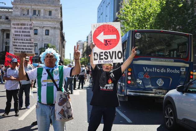 October 8, 2025, Buenos Aires, Buenos Aires, Argentina: Retirees and pensioners protest in the streets against President Javier MileiÃ¢â‚¬â ¢s austerity measures in front of the National Congress. Buenos Aires Argentina - ZUMAp265 20251008_zip_p265_001 Copyright: xDelfinaxCorberaxPix