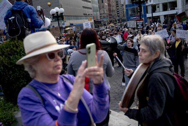 October 18, 2025, New York, New York, USA: Protesters march down Broadway during the â€oeNo Kings†rally in New York, Saturday, Oct. 18, 2025. The demonstration began in Times Square and ended in Union Square, drawing an estimated 50,000 people who joined others across the country calling for the protection of democratic institutions and denouncing authoritarian leadership. Organizers said more than 5 million people participated in over 2,000 marches nationwide. New York USA - ZUMAa306 20251018_znp_a306_002 Copyright: xJavierxAlvarezx