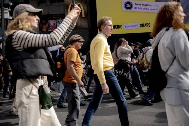 October 18, 2025, New York, New York, USA: Protesters march down Broadway during the â€oeNo Kings†rally in New York, Saturday, Oct. 18, 2025. The demonstration began in Times Square and ended in Union Square, drawing an estimated 50,000 people who joined others across the country calling for the protection of democratic institutions and denouncing authoritarian leadership. Organizers said more than 5 million people participated in over 2,000 marches nationwide. New York USA - ZUMAa306 20251018_znp_a306_008 Copyright: xJavierxAlvarezx