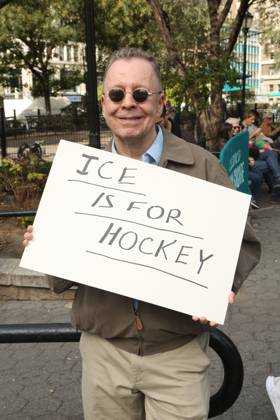 October 18, 2025, New York City, New York, USA: A man holds a sign that says ICE is for Hockey during the No Kings protest in New York City on Oct. 18, 2025. Tens of thousands of people hit New York City streets to protest Donald Trump, autocracy, ICE and immigrant deportations. More than 2,500 similar protests took place nationwide. New York City USA - ZUMAk45_ 20251018_zaf_k45_054 Copyright: xKristaxKennellx