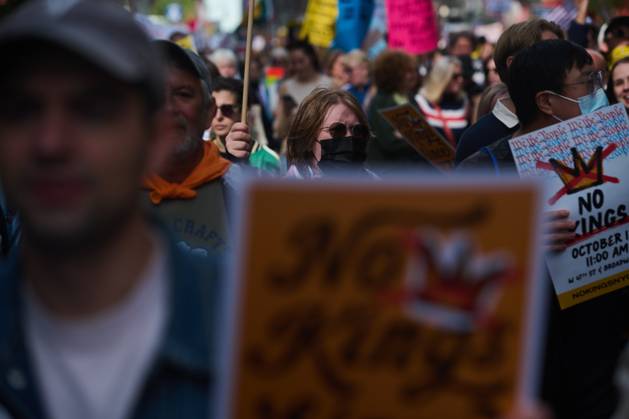 October 18, 2025, New York, New York, USA: Protesters march down 7th Avenue in the New York City No Kings protest with an estimated 100,000 people in attendance in all five boroughs combined demonstrating in opposition to measures Donald Trump has taken to install authoritarian style rule. New York USA - ZUMAl171 20251018_znp_l171_004 Copyright: xEdnaxLeshowitzx