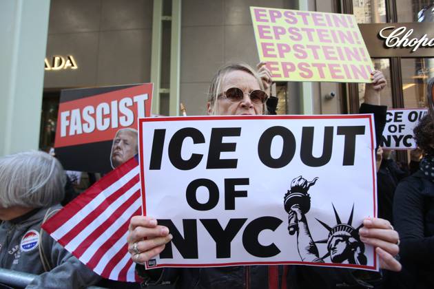 October 25, 2025, New York City, New York, USA: A woman holds a sign that says ICE Out of NYC during a Hands Off NYC rally. outside of Trump Tower on October 25, 2025. Some women wore polka dots in honor of a protestor who confronted ICE agents and tank vehicles. The peaceful rally drew a handful of Trump supporters. New York City USA - ZUMAk45_ 20251025_zaf_k45_010 Copyright: xKristaxKennellx