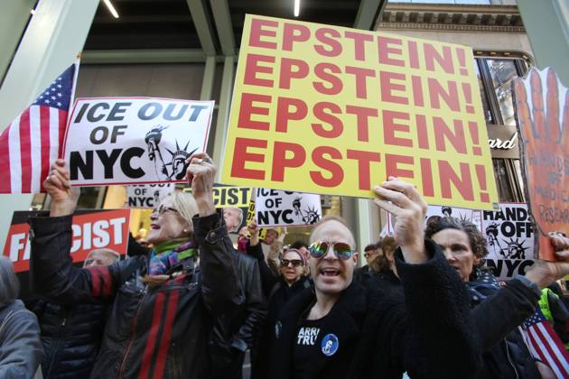 October 25, 2025, New York City, New York, USA: A man holds a sign that says Epstein! Epstein! Epstein!Epstein! during a Hands Off NYC rally. outside of Trump Tower on October 25, 2025. Some women wore polka dots in honor of a protestor who confronted ICE agents and tank vehicles. The peaceful rally drew a handful of Trump supporters. New York City USA - ZUMAk45_ 20251025_zaf_k45_014 Copyright: xKristaxKennellx