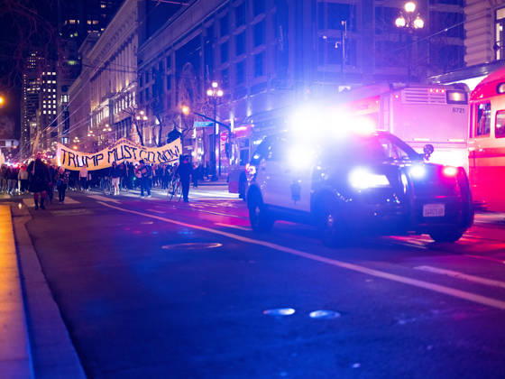 January 7, 2026, San Francisco, California, USA: A San Francisco Police cruiser escorts a rally and march against the Immigration and Customs Enforcement (ICE) killing of U.S. citizen Renee Nicole Good in San Francisco on Wednesday, Jan. 7, 2026. An officer shot and killed Good during an immigration enforcement action. San Francisco USA - ZUMAk157 20260107_znp_k157_010 Copyright: xJunghoxKimx