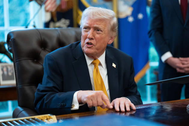 President Donald Trump gives remarks to the media as he signs an executive order in the Oval Office of the White House in Washington, DC on Monday, March 16, 2026. The order will formally launch a task force, led by Vice President JD Vance, to investigate fraud nationwide. WAP20260316016 AARONxSCHWARTZ