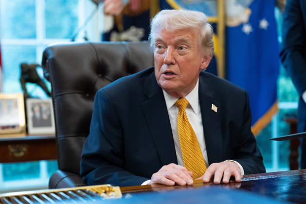 President Donald Trump gives remarks to the media as he signs an executive order in the Oval Office of the White House in Washington, DC on Monday, March 16, 2026. The order will formally launch a task force, led by Vice President JD Vance, to investigate fraud nationwide. WAP20260316017 AARONxSCHWARTZ