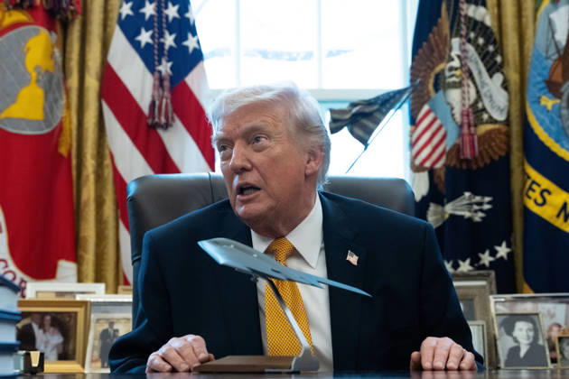 President Donald Trump gives remarks with a model stealth bomber on the Resolute Desk during an Executive Order signing event in the Oval Office of the White House in Washington, DC on Monday, March 16, 2026. The order will formally launch a task force, led by Vice President JD Vance, to investigate fraud nationwide. WAP20260316078 AARONxSCHWARTZ