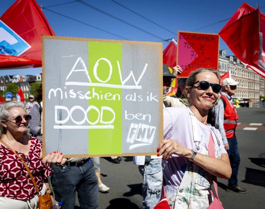 AMSTERDAM - Demonstrators during an FNV march against the coalition agreement on Labour Day. The union believes that Europe is scaling back legislation and regulations that protect workers too much. SEM VAN DER WAL ANP netherlands out - belgium out Copyright: xx x557208786x originalFilename: 557208786