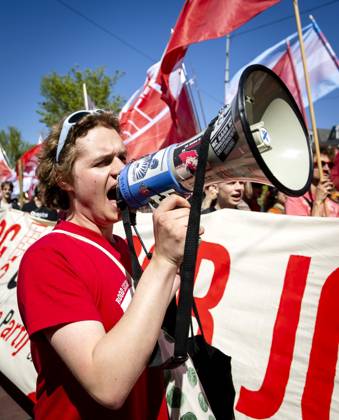 AMSTERDAM - Demonstrators during an FNV march against the coalition agreement on Labour Day. The union believes that Europe is scaling back legislation and regulations that protect workers too much. SEM VAN DER WAL ANP netherlands out - belgium out Copyright: xx x557210072x originalFilename: 557210072