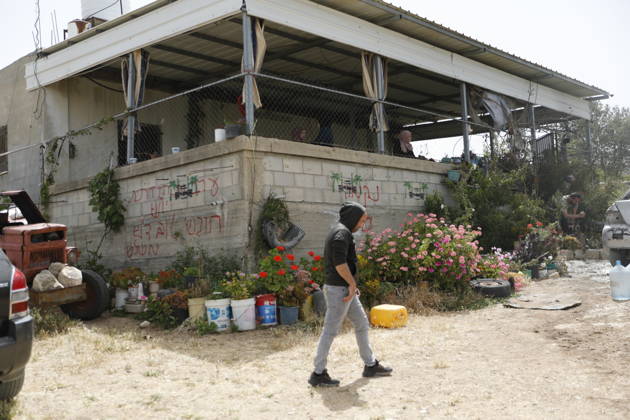 Palestinians inspect damage after settler attack near Hebron Palestinians inspect damage at the site of an attack carried out by Israeli settlers targeting Palestinian vehicles and property in the town of Surif northwest of Hebron in the occupied West Bank on May 17, 2026. Settlers set fire to a vehicle and spray-painted racist slogans at the scene, amid anger and condemnation among Palestinian residents over repeated attacks on their property. Photo by Mamoun Wazwaz apaimages Hebron West Bank Palestinian Territory 170526_Hebron_MW_00(35) Copyright: xapaimagesxMamounxWazwazx xapaimagesx