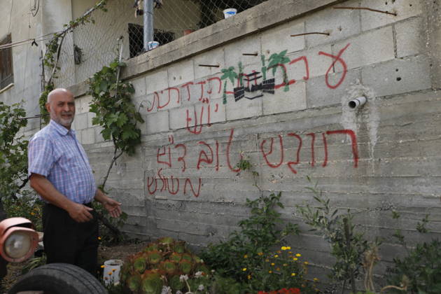 Palestinians inspect damage after settler attack near Hebron Palestinians inspect damage at the site of an attack carried out by Israeli settlers targeting Palestinian vehicles and property in the town of Surif northwest of Hebron in the occupied West Bank on May 17, 2026. Settlers set fire to a vehicle and spray-painted racist slogans at the scene, amid anger and condemnation among Palestinian residents over repeated attacks on their property. Photo by Mamoun Wazwaz apaimages Hebron West Bank Palestinian Territory 170526_Hebron_MW_00(26) Copyright: xapaimagesxMamounxWazwazx xapaimagesx
