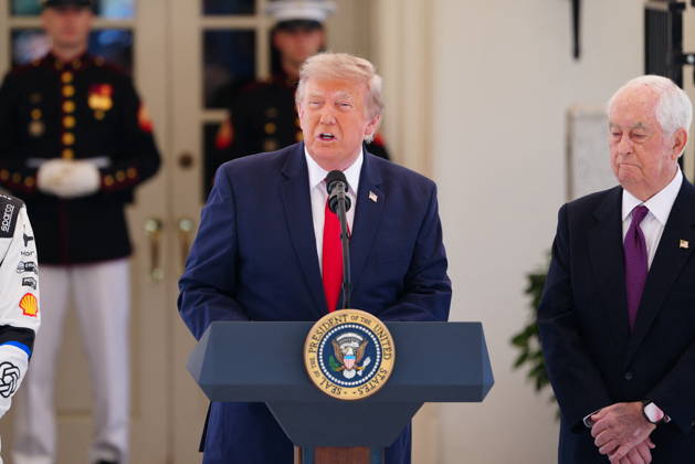 United States President Donald J Trump makes remarks as he hosts top IndyCar drivers at the White House in Washington, DC, USA, to promote the inaugural Freedom 250 Grand Prix on Monday, July 13, 2026. The race will be held in DC on August 22-23, 2026. Looking on from right is IndyCar series owner Roger Penske. Credit: CNP AdMedia Washington District of Columbia United States of America EDITORIAL USE ONLY  Copyright: xx AdMediax admphotosthree005104