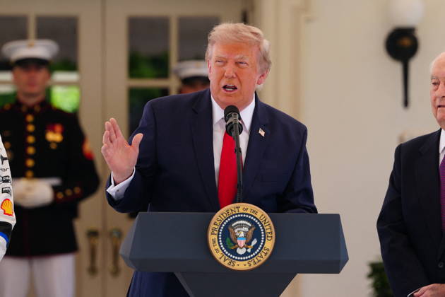 United States President Donald J Trump makes remarks as he hosts top IndyCar drivers at the White House in Washington, DC, USA, to promote the inaugural Freedom 250 Grand Prix on Monday, July 13, 2026. The race will be held in DC on August 22-23, 2026. Looking on from right is IndyCar series owner Roger Penske. Credit: CNP AdMedia Washington District of Columbia United States of America EDITORIAL USE ONLY  Copyright: xx AdMediax admphotosthree005105