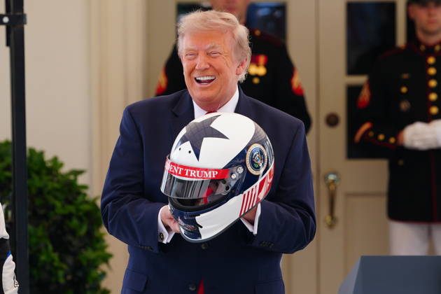 United States President Donald J Trump holds a racing helmet as he hosts top IndyCar drivers at the White House in Washington, DC, USA, to promote the inaugural Freedom 250 Grand Prix on Monday, July 13, 2026. The race will be held in DC on August 22-23, 2026. Credit: CNP AdMedia Washington District of Columbia United States of America EDITORIAL USE ONLY  Copyright: xx AdMediax admphotosthree005108