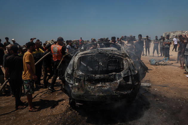 Israeli attacks continue in Gaza GAZA, PALESTINE - JULY 21 : Firefighters and local Palestinians attempt to extinguish a burning civilian vehicle after it was targeted in an Israeli attack in the Nuseirat refugee camp in the central Gaza Strip on July 21, 2026 in Gaza, Palestine. Abdalhkem Abu Riash Anadolu Gaza City Gaza. Editorial use only. Please get in touch for any other usage.  Copyright: x2026xAnadoluxAbdalhkemxAbuxRiashx