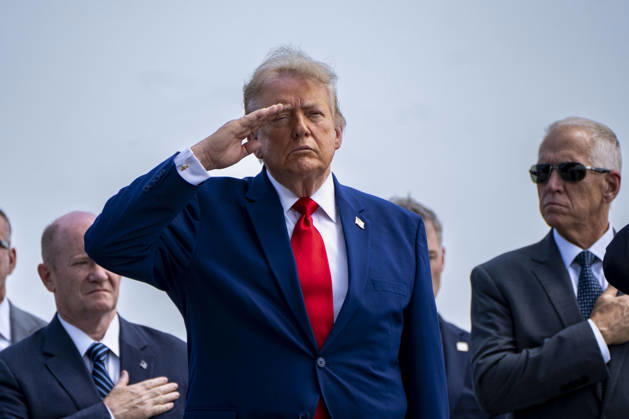 President Donald Trump salutes during the dignified transfer of Army 1st Lt. Tyler James Feehan, Army Staff Sgt. Emmanuel Swinton, Army Sgt. Angel Rampersad and Army Pvt. Isabella Gonzales at Dover Air Force Base in Dover, Delaware on Wednesday, July 22, 2026.  WAP20260722355 BONNIExCASH
