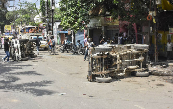 Clashes erupt between police and protesters erupt during the Bihar Bandh protest Patna, Jul 25 (ANI): A view of the police vehicles damaged by protesters during the Bihar Bandh protest against the NEET paper leak, in Patna on Saturday. PATNA BIHAR INDIA Copyright: xANIx ANI_20260725421