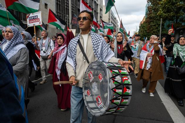 October 3, 2026, Berlin, Germany: BERLIN, GERMANY Ã¢â‚¬ OCTOBER 3, 2026: Thousands of people took part in a peace demonstration in central Berlin on German Unity Day. A coalition of peace initiatives, trade unions, and political and civil-society groups organized the protest. The demonstrators focused on military rearmament, the possible reintroduction of conscription, and GermanyÃ¢â‚¬â ¢s military policy. The march began at the Brandenburg Gate and continued through the government district before concluding with a rally. The demonstration brought together participants expressing opposition to GermanyÃ¢â‚¬â ¢s current and proposed military policies on a national public holiday. Berlin Germany - ZUMAq101 20261003_zna_q101_089 Copyright: xJessxFlomx